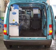 A Ford Connect with racking and equipment by Syncro 